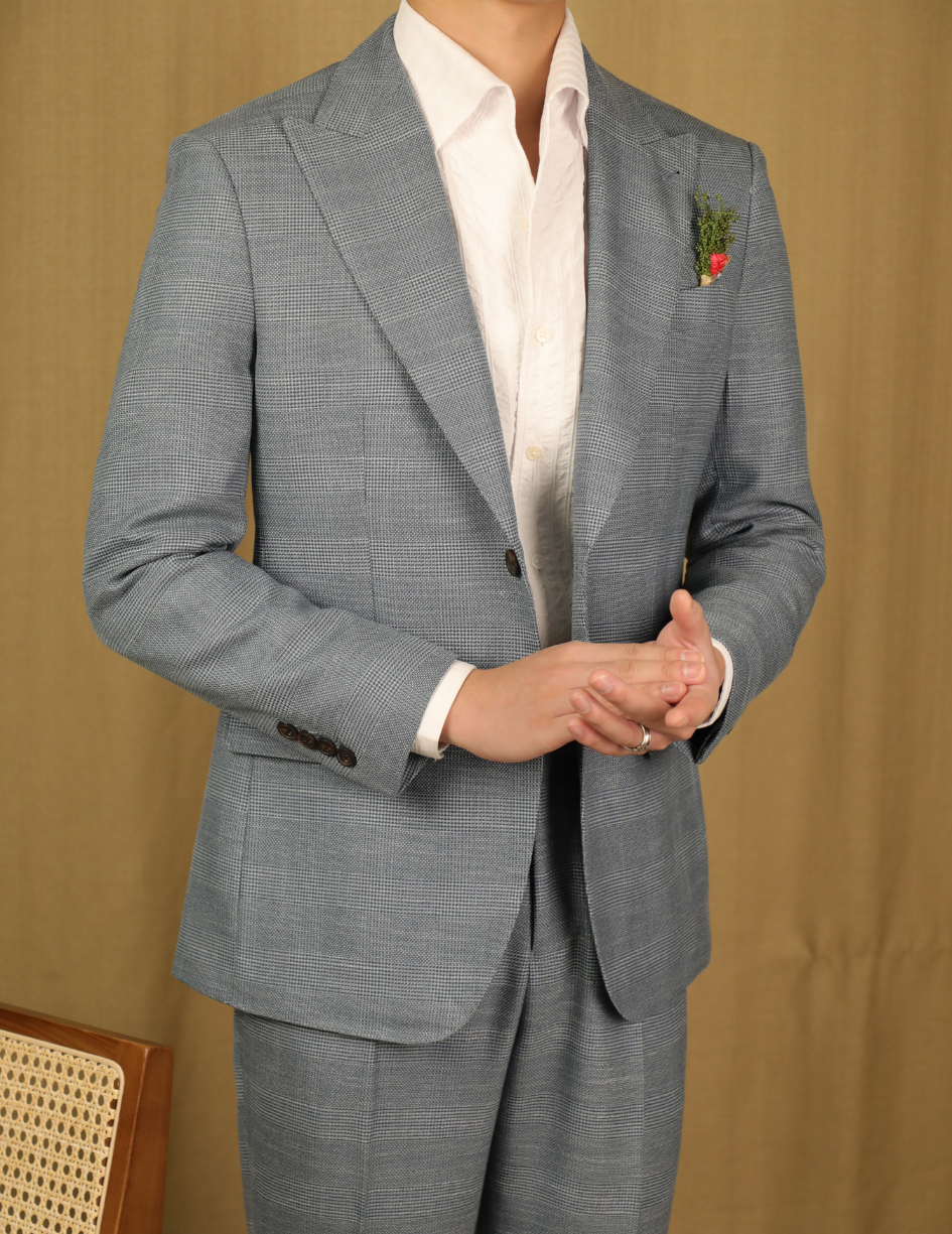Traje de dos botones con estampado príncipe de Gales gris