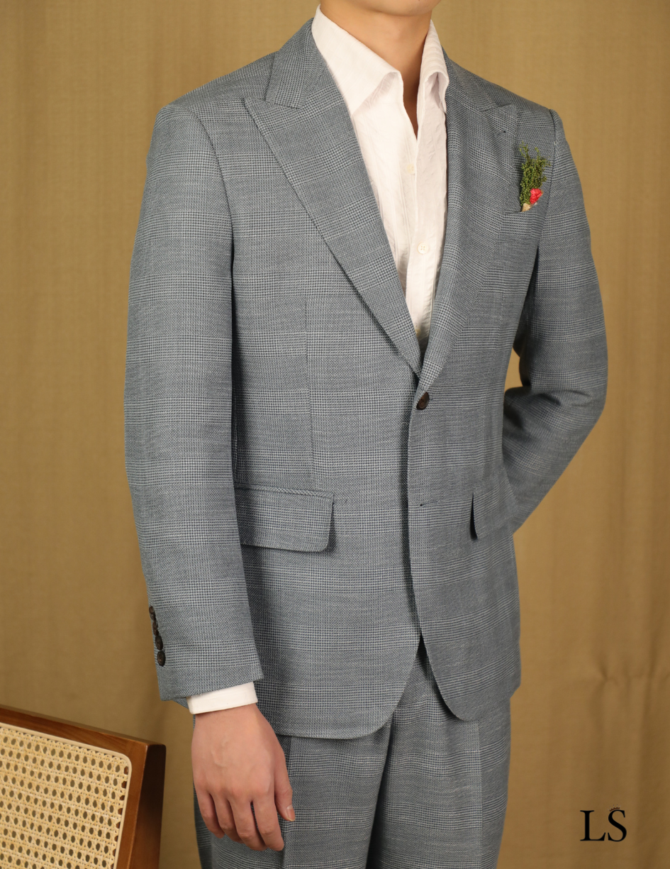 Traje de dos botones con estampado príncipe de Gales gris