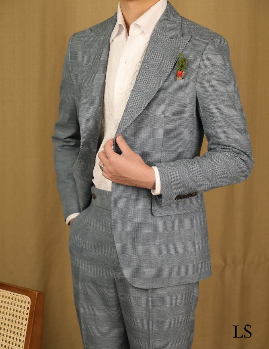 Traje de dos botones con estampado príncipe de Gales gris