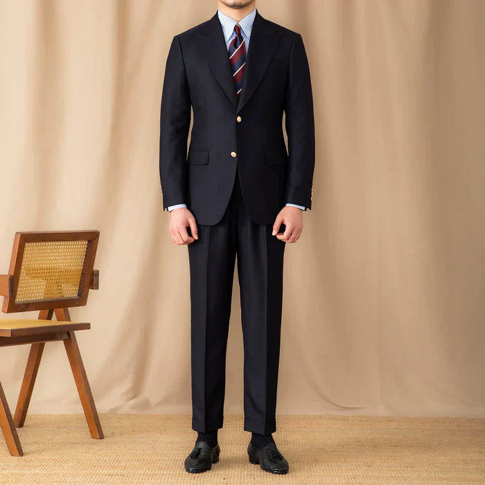 Traje negro británico de dos botones